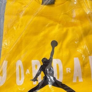 New size medium Jordan Bright Yellow Tee brand new. No low offers please!